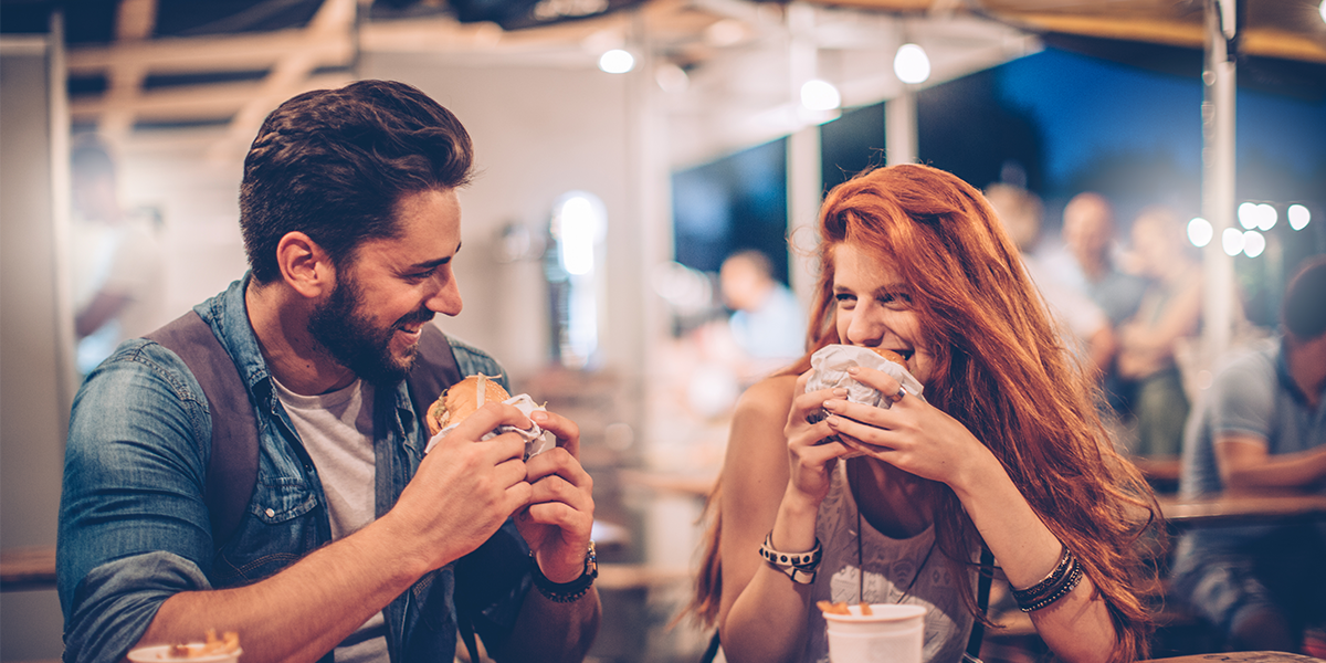 Man and women meeting and dating organically at a bar